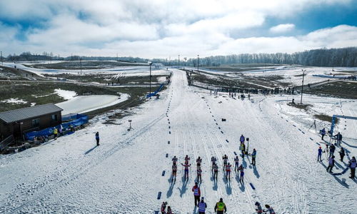 Snowy landscape with athletes preparing for winter sports, evoking excitement, serenity, adventure, and community.