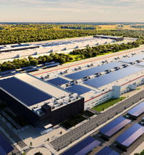Industrial facility with solar panels, organized layout, and greenery, symbolizing progress, efficiency, and harmony with nature.