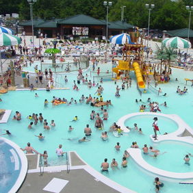A lively water park scene with joyful crowds enjoying slides, pools, and summer fun under colorful umbrellas.