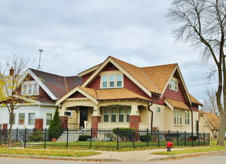 Charming residential neighborhood with cozy homes, inviting roofs, green lawns, and a tranquil, suburban atmosphere.