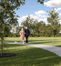 A serene park scene with a couple walking a dog along a path, lush greenery, and a bench, evoking peace and companionship.