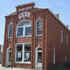 Historic Clay City National Bank, with classic architecture, evokes nostalgia in a quaint, inviting small-town setting.