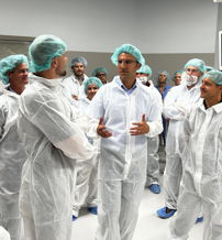 Medical team in scrubs engaged in a training session, showing collaboration and focus in a healthcare environment.