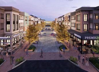 Urban street scene with modern buildings, retail, dining, trees, and people, evoking community vibrancy and a welcoming atmosphere.