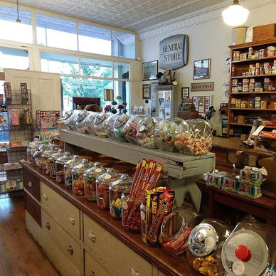 Vintage general store with colorful candies and nostalgic items, evoking warmth and childhood memories. Cheerful and inviting.