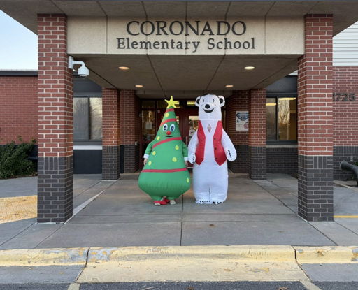 Inflatable Christmas tree and polar bear at Coronado Elementary create a cheerful, festive atmosphere for the holiday season.
