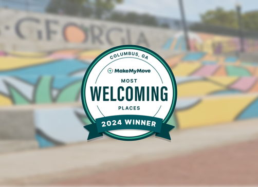 A vibrant mural with a "Most Welcoming Places" badge, celebrating hospitality and evoking a warm, inviting atmosphere.